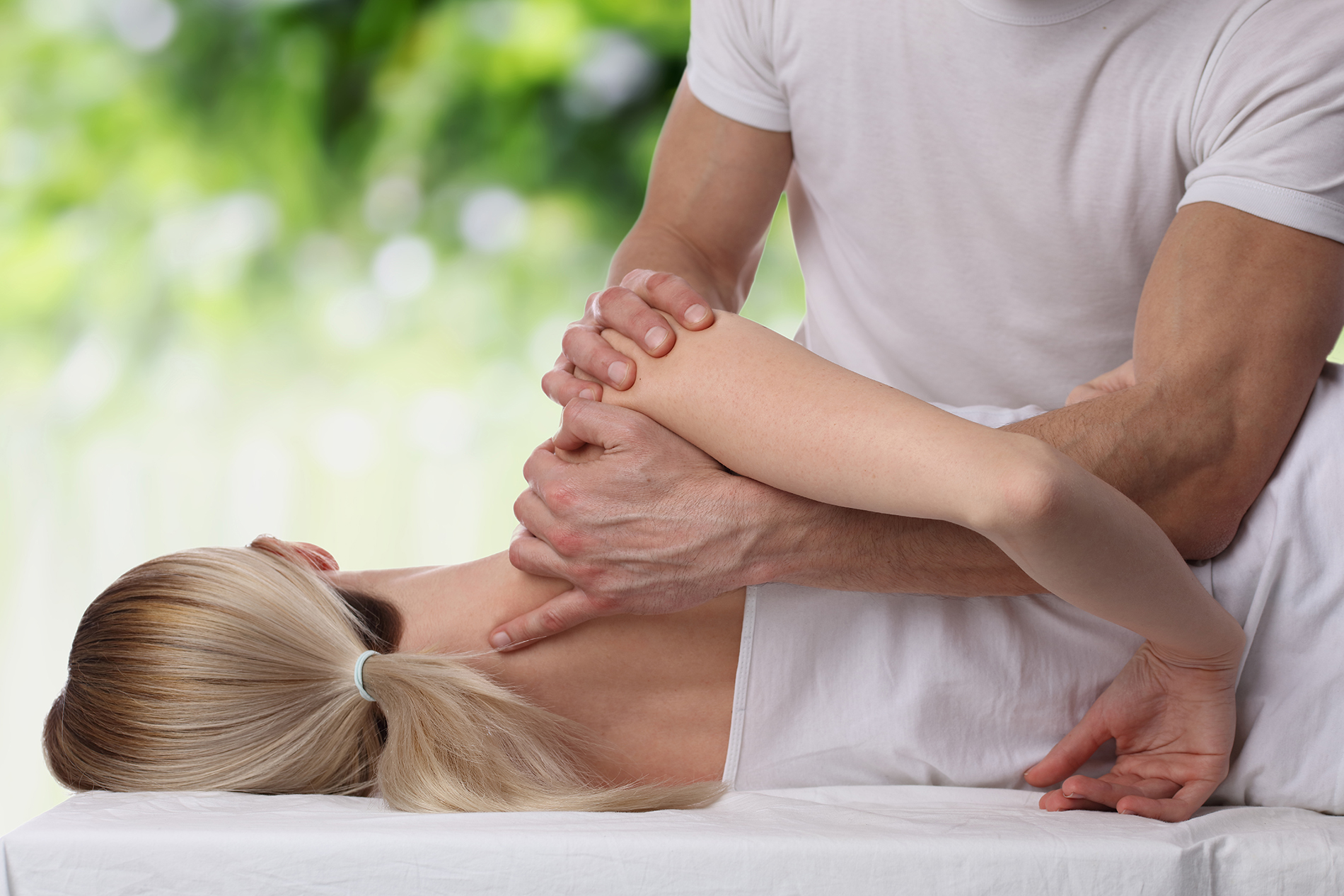 Chiropractic,,Osteopathy,,Dorsal,Manipulation.,Therapist,Doing,Healing,Treatment,On,Women's Chiropractic, osteopathy, dorsal manipulation. Therapist doing healing treatment on women's back . Alternative medicine, pain relief concept.