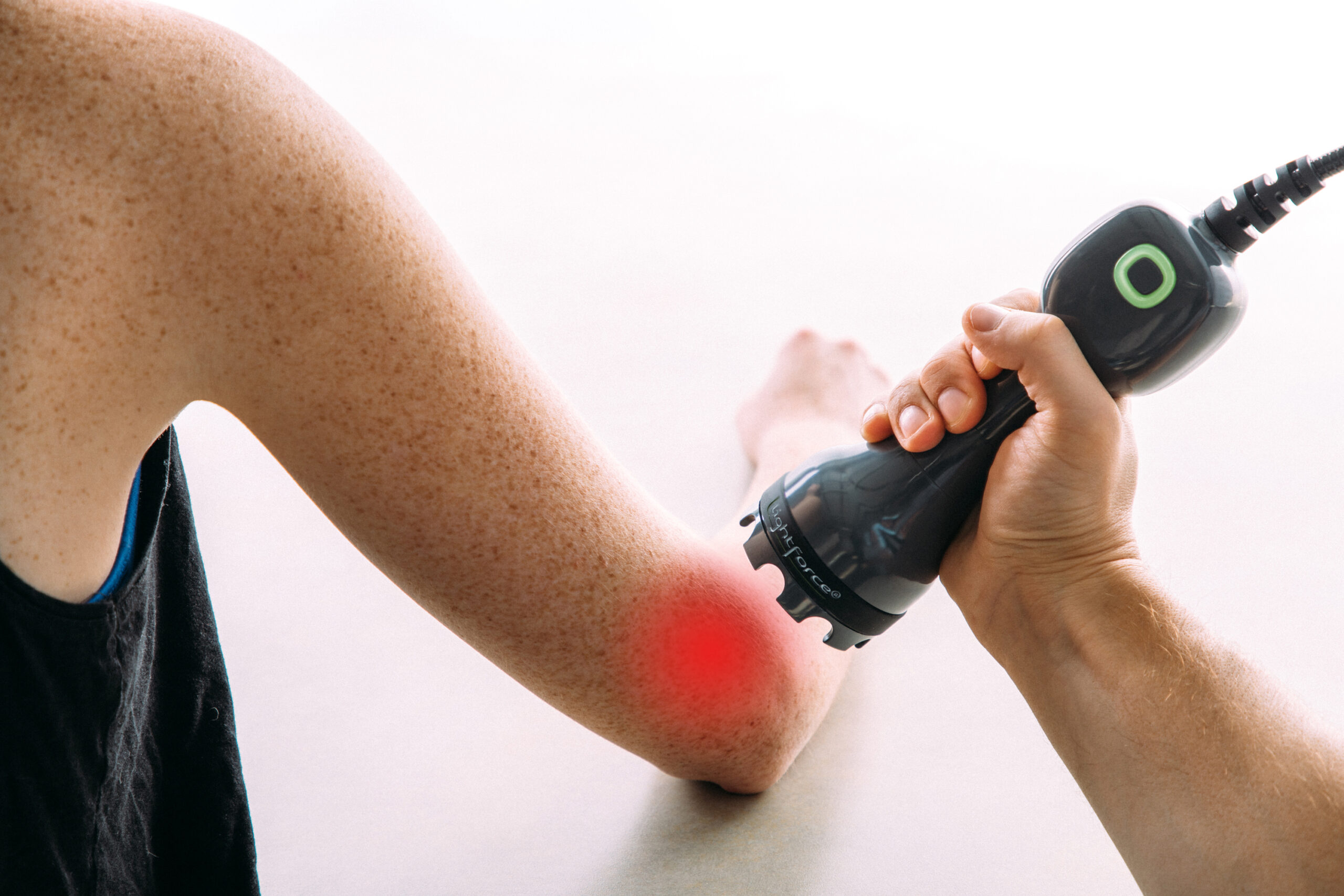 Class IV laser treatment on the elbow for golfer's elbow at Adisi Health Center in Hinsdale, IL